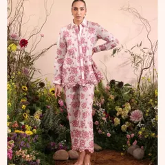 A beautiful pink and white floral co-ord set, perfect for a brunch date. The scalloped hem adds a playful, feminine detail.