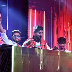 Sharing the stage with fellow artists at a Holi festival. The camaraderie and shared energy make these events special.