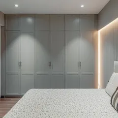 For this wardrobe, our vision was timeless elegance. The earthy-toned Italian lacquer finish brings warmth, while subtle routing patterns add depth. Paired with antique-finished handles, the result is a sophisticated piece that belongs completely in its space.