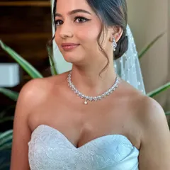 The angelic glow of a Christian bride. For Beracah, we created a soft glam look with gentle features and luminous skin, ensuring her natural grace was the highlight of her wedding day look.