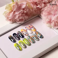 A beautiful collection of marble nail art. I teach various techniques to create these fluid, natural-looking stone patterns in different color combinations.
