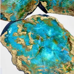 This artwork showcases the beauty of turquoise resin art. I teach how to create this realistic stone effect with deep colors and golden veins in my professional online workshops.