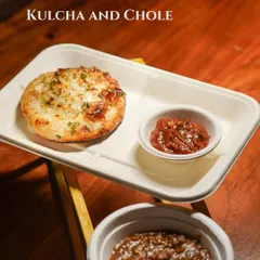 A comforting plate of Kulcha and Chole, a classic North Indian dish executed perfectly.
