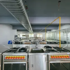 The main line at our culinary academy, featuring individual cooking stations for a truly hands-on learning experience.