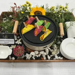 A playful and delicious fusion of Indian and Mexican cuisine. Our colourful Paneer Khurchan Tacos are served on a miniature grill, making for an interactive and memorable appetizer.