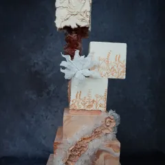 A preview of our "Art of Tiered Elegance" workshop, featuring a modern, multi-shaped structural cake. This class focuses on advanced techniques like internal supports, weight balancing, and achieving sharp edges on unconventional shapes.