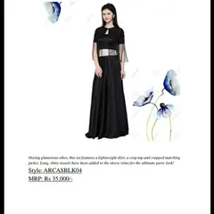 This catalogue shot presents a glamorous black set with a lightweight skirt, crop top, and a matching jacket with shiny tassels. This ultimate party look from our AARNA collection was originally priced at Rs 35,000.