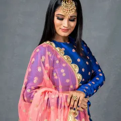 A side profile showcasing the contouring and the way the smokey eye enhances her features. The jewellery, a stunning passa, is also from my collection.