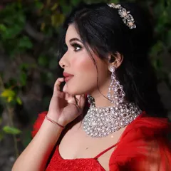 Channeling my inner Disney Princess with this dramatic red gown. I styled it with a statement diamond necklace and elegant hair accessories for a truly glamorous, fairytale-inspired evening look.