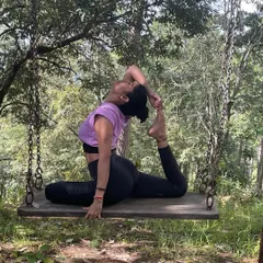 A variation of One-Legged King Pigeon Pose on a swing. This asana provides a deep stretch for the hip flexors and opens the chest and shoulders, a perfect example of creative practice.
