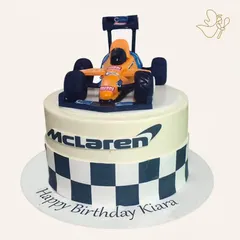 Racing into a happy birthday! Kiara from Greater Kailash celebrated with this sleek McLaren-themed cake. It's the perfect choice for a young Formula 1 fan who loves speed and excitement.