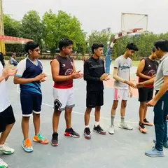 Senior players showing sportsmanship after a tough game.