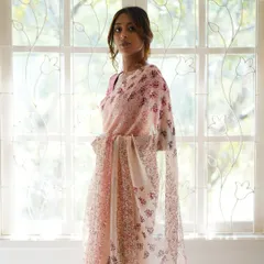 The Kāmini saree, crafted from dreamy silk chiffon, is a delicate floral beauty. It took 80 hours to create, using 20 different hand-carved vintage woodblocks to achieve its soft, flowing design.