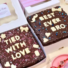 Say it with brownies. My customizable brownie tiles are perfect for Rakhi, letting you add a personal message like "Best Ever Bro" or "Tied With Love" on a delicious, fudgy, and eggless chocolate base.