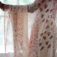 The Kāmini saree, crafted from dreamy silk chiffon, is a delicate floral beauty. It took 80 hours to create, using 20 different hand-carved vintage woodblocks to achieve its soft, flowing design.