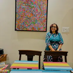 My art in its new home. This framed canvas print of my piece 'It’s all connected' looks so beautiful at my aunt's house. I love how the simple frame and light wall make the colors pop.