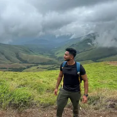 Taking a moment to soak in the panoramic views from the Kudremukha trail. The feeling of being surrounded by such vast, untouched nature is what our weekend treks are all about.