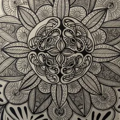 The finished wall mandala, a result of hours of dedication. I love how the symmetry and flow of the design came together to create a soothing and beautiful piece of wall art.