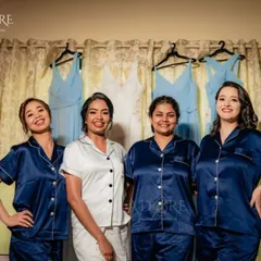 The bride and her bridesmaids sharing a laugh before the big day. We help coordinate these special moments that you'll cherish forever.