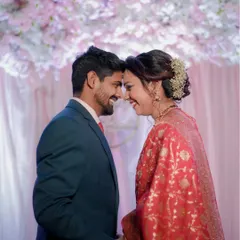An intimate moment between the couple during their reception. I aim to capture the unscripted smiles and laughter that truly define your relationship, creating candid portraits you will cherish forever.