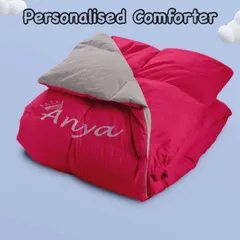 Snuggle up in style with our personalised quilted comforter. This cozy pink comforter is embroidered with a name and a crown, making it fit for a princess.