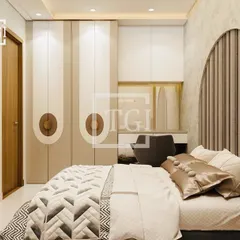 A proposed bedroom design that balances style and function. The room features a custom wardrobe with unique circular handles, an arched headboard, and a dedicated study nook, all in a soothing, earthy color scheme.