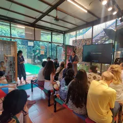 A presentation in progress for a visiting student group. These sessions provide deeper context on the history of puppetry, the stories we tell, and the philosophical underpinnings of our art form.
