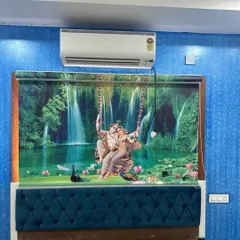 This vibrant 3D printed roller blind shows Radha and Krishna against a lush waterfall backdrop. It's a bold statement piece that brings both artistry and a sense of tranquility to a bedroom.
