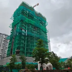 This image captures the Serein project under construction, with safety netting enveloping the structure. It demonstrates the scale of our residential developments and the progress towards creating a new urban community.