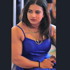 A candid shot, showing a moment of thought. Being a Kannadathi is a core part of my identity.