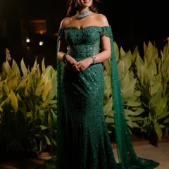 A full-length shot showing the complete reception look. The soft glam makeup perfectly balances the drama of the sequined Tarun Tahiliani gown and its flowing cape.