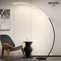 Embrace the beauty of minimalism with our modern arc floor lamp. Its sleek, sweeping curve provides overhead lighting with grace and simplicity, making it a perfect addition over a sofa or reading chair for a touch of contemporary elegance.