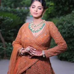 Another shot of the model, showcasing how a simple henna design can beautifully complement a glamorous party outfit.