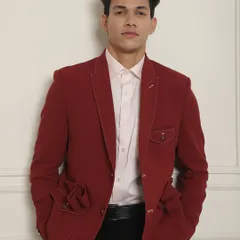 A confident stance in my red designer suit jacket. My suits are designed to match your personality, ensuring you look and feel your best.