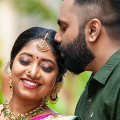 A close-up, candid shot capturing a tender moment between the couple during their baby shower celebration. These intimate portraits are a cherished part of the event's story.