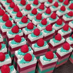 A fresh batch of my popular Strawberry soaps, remade for the nth time! The layers, piped topping, and little strawberry embed make this a customer favorite.