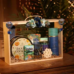This is one of my favorite premium Diwali hampers. Packed in a beautiful wooden crate with acrylic slides, it includes gourmet cookies, sweets, and elegant decor items, perfect for making a lasting impression on clients or employees.