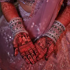 The magic is in the stain. This is the beautiful, deep reddish-brown color you can expect from my all-natural henna paste after it develops. It looks so stunning against the bridal lehenga.