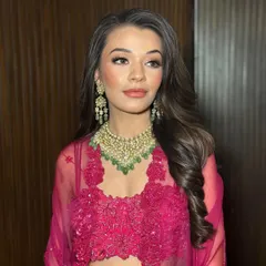 A different angle of Tanisha's glamorous look, showcasing the beautiful contour and highlight that catches the light perfectly.