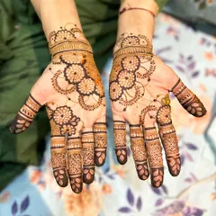 This beautiful floral design features bold flower outlines with delicate shading inside. The flowing pattern creates a sense of movement, making it a graceful choice for any occasion.
