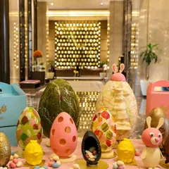 Getting into the festive spirit with our Easter-themed dessert spread. We create a variety of treats, including large, beautifully decorated chocolate eggs and other sweet delights that are perfect for holiday celebrations.
