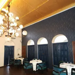 Step inside to a world of modern Indian luxury. My indoor dining space combines opulent gold ceilings, rich textures, and elegant seating to create a sophisticated and intimate atmosphere for your celebration.