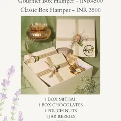 Details of our Diwali Gourmet and Classic Box Hampers. This image provides pricing and lists the contents, including mithai, chocolates, nuts, and a diya.