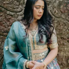 Starting the wedding season with this gorgeous bride's first function. The makeup is soft and natural, with wavy hair, perfect for an outdoor event.