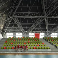 The tiered seating inside the 'Figured Ground' sports arena, with vibrant green and orange seats creating a lively pattern against the concrete steps. The exposed steel truss roof structure spans the entire hall, allowing for an unobstructed view of the court.