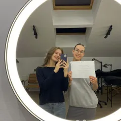A happy student and her instructor taking a celebratory selfie after completing a training course. We build strong, supportive relationships with our students.