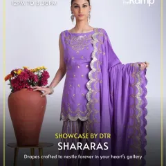 This purple sharara set is a beautiful example of the draped, elegant styles in our collection. The straight-cut kurta with intricate gold embroidery and a matching scalloped dupatta is perfect for a wedding or festive event.