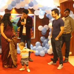 On stage with my happy clients. My job is to make sure the family can relax and enjoy the party while I handle the entertainment.