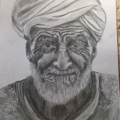 A completed charcoal and pencil portrait of a man in a turban. In this piece, we practiced rendering different textures, from the soft folds of the fabric to the coarse texture of the beard and the deep lines on his face.