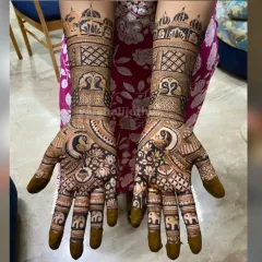 This is the kind of stunning, professional-level work my students can create after completing the course. This full-hand bridal design features detailed palace architecture, peacock motifs, and tiny elephants, showcasing advanced finishing techniques.